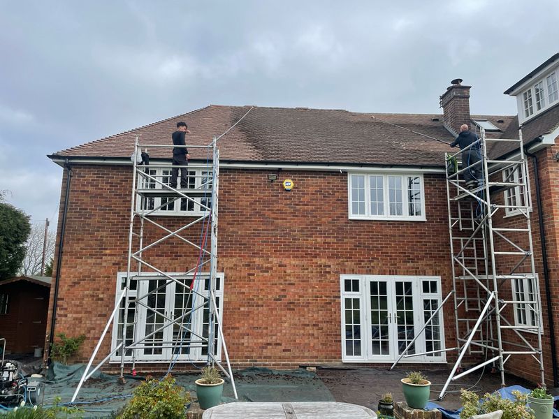 Roof cleaning carried out safely from scaffold towers by The Roof Moss Cleaners in Bicester